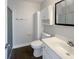 Clean bathroom with white cabinets, a walk-in shower, and neutral walls and flooring at 5210 Sandy Forge Dr, Indianapolis, IN 46221