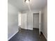 Light-filled room with tiled flooring, neutral paint, and a closet, offering a versatile space for various uses at 5210 Sandy Forge Dr, Indianapolis, IN 46221