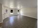 Open entryway featuring tile floors, two windows and a decorative front door at 5210 Sandy Forge Dr, Indianapolis, IN 46221