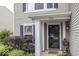 Close up of the front entrance featuring a 'Welcome' mat and a decorative front door at 5504 Grassy Bank Dr, Indianapolis, IN 46237