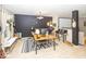 Open-concept living area featuring modern decor, ample lighting, and comfortable seating at 5504 Grassy Bank Dr, Indianapolis, IN 46237