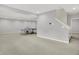 Large finished basement with carpet and recessed lighting provides a game area at 5761 Coopers Hawk Dr, Carmel, IN 46033