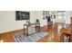 Cozy office featuring hardwood floors and a fireplace at 5761 Coopers Hawk Dr, Carmel, IN 46033
