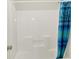 Simple white shower stall with a blue shower curtain at 5761 Coopers Hawk Dr, Carmel, IN 46033