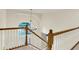 Open staircase design with a modern chandelier and ample natural light at 5761 Coopers Hawk Dr, Carmel, IN 46033