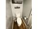 This bathroom features a toilet and a new, patterned wood-look floor at 6588 Dunsdin Dr, Plainfield, IN 46168