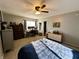 A comfortable bedroom with neutral walls, carpet, and natural light from the window at 6588 Dunsdin Dr, Plainfield, IN 46168