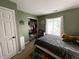 Bedroom with natural light and a closet, showcasing a comfortable and inviting space at 6588 Dunsdin Dr, Plainfield, IN 46168