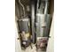 Water heater and furnace system installed in a closet at 6588 Dunsdin Dr, Plainfield, IN 46168