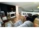 Relaxing living room equipped with a modern fireplace, television, and comfortable seating at 6588 Dunsdin Dr, Plainfield, IN 46168