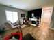 Features a modern fireplace with built-in bookshelves, perfect for storage and displaying decor at 6588 Dunsdin Dr, Plainfield, IN 46168