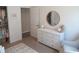 Bright Bedroom with a six drawer dresser, a mirror and an accent rug at 7232 Moultrie Dr, Indianapolis, IN 46217