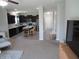 Modern kitchen with dark cabinets, stainless steel appliances, and a functional island at 7232 Moultrie Dr, Indianapolis, IN 46217