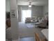 Inviting living room featuring a cozy sectional sofa and sliding glass doors at 7232 Moultrie Dr, Indianapolis, IN 46217