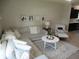 Bright living room featuring a comfortable sectional sofa and decorative pillows at 7232 Moultrie Dr, Indianapolis, IN 46217
