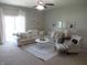 Comfortable living room with neutral tones, a plush sofa, and stylish decor at 7232 Moultrie Dr, Indianapolis, IN 46217