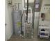 Utility room with water heater, HVAC system, and cart for storage at 7232 Moultrie Dr, Indianapolis, IN 46217