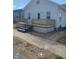 Charming home boasts a freshly updated exterior and cozy, inviting front porch at 803 S Pershing Dr, Muncie, IN 47302