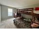 Bedroom with carpet, dresser and a wooden bunk bed at 8323 Lake Tree Ln, Indianapolis, IN 46217
