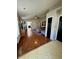 Spacious living room with hardwood floors, neutral walls, and vaulted ceilings at 8323 Lake Tree Ln, Indianapolis, IN 46217