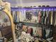 Large walk-in closet with ample storage, shelving, and rod space for organized clothing and accessories at 8423 Mud Creek Rd, Indianapolis, IN 46256