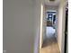 Hallway view leading to bedroom with carpeted floor and neutral paint at 8423 Mud Creek Rd, Indianapolis, IN 46256