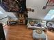 Comfortable living area with skylights, hardwood floors, and eclectic decor at 8423 Mud Creek Rd, Indianapolis, IN 46256
