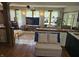 Bright living room featuring large windows, hardwood floors, and an open layout concept at 8423 Mud Creek Rd, Indianapolis, IN 46256