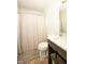 Bathroom featuring a shower and tub, a toilet, vanity and mirror at 8514 Midsummer Dr, Indianapolis, IN 46239