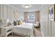 Calming bedroom with a plush bed, soft lighting, and soothing color palette at 920 State St, Shelbyville, IN 46176