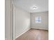 Bedroom featuring modern light fixture, flooring and large window at 920 State St, Shelbyville, IN 46176