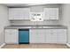 Spacious kitchen featuring stainless appliances and white cabinetry with granite counter tops at 920 State St, Shelbyville, IN 46176