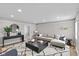 Inviting living room featuring a large sectional sofa and modern decor at 920 State St, Shelbyville, IN 46176
