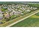 Beautiful neighborhood with well-kept lawns, mature trees, and a refreshing community pool at 10716 Patoka Rd, Indianapolis, IN 46239