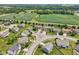 Stunning aerial view of a well-maintained neighborhood with lush green landscaping and mature trees at 10716 Patoka Rd, Indianapolis, IN 46239