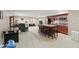 Finished basement with a kitchenette, recreational area and neutral flooring for a versatile space at 10716 Patoka Rd, Indianapolis, IN 46239