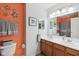 Bathroom showcasing double sinks, warm-toned walls, and stylish fixtures for a functional and inviting space at 10716 Patoka Rd, Indianapolis, IN 46239
