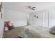 Relaxing bedroom with a cozy bed, colorful decor, and ample space for creating a personalized retreat at 10716 Patoka Rd, Indianapolis, IN 46239