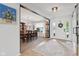 Bright foyer with hardwood floors, leading to an elegant dining room and an open living area at 10716 Patoka Rd, Indianapolis, IN 46239