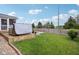 View of a hot tub on a wooden deck in a well-manicured and maintained backyard at 10716 Patoka Rd, Indianapolis, IN 46239