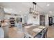 Spacious kitchen with stainless steel appliances, granite countertops, and a central island with seating at 10716 Patoka Rd, Indianapolis, IN 46239