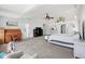 Spacious main bedroom with high ceilings, plush carpet, and a bonus nook for decor or storage at 10716 Patoka Rd, Indianapolis, IN 46239