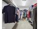 Large walk-in closet with wire shelving for optimal storage and organization of clothes and shoes at 10716 Patoka Rd, Indianapolis, IN 46239