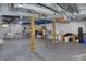 Spacious unfinished basement with exposed pipes and painted blue ceiling at 115 Northshore Blvd, Anderson, IN 46011