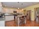 Modern kitchen features an island, stainless steel appliances, and lots of natural light at 115 Northshore Blvd, Anderson, IN 46011