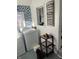 Close up of laundry room featuring side-by-side washer and dryer, and wall decor at 118 S Swain St, Ingalls, IN 46048