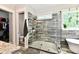 Glass shower in bathroom with adjacent closet, toilet, and granite countertop at 1284 N Letterman Rd, Paragon, IN 46166