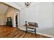Neutral living room with wood-look floors, and a desk near a doorway at 1284 N Letterman Rd, Paragon, IN 46166
