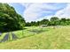 Scenic view of the property with well maintained grass, an enclosed garden, and a barn at 1284 N Letterman Rd, Paragon, IN 46166