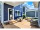 Charming backyard patio with comfortable seating, and a view of the meticulously maintained lawn at 12874 Tradd St, Carmel, IN 46032